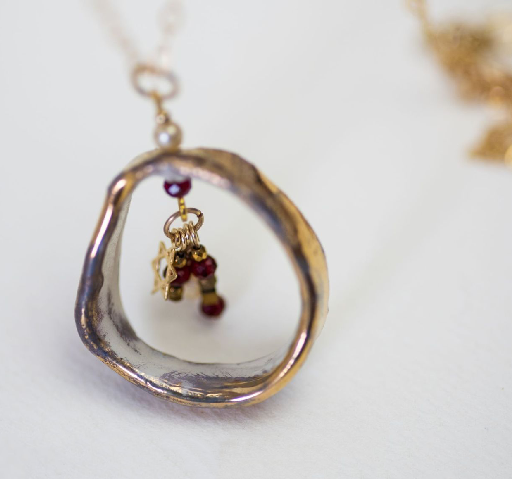 Circle of Love Pendant with Ruby Crystals
